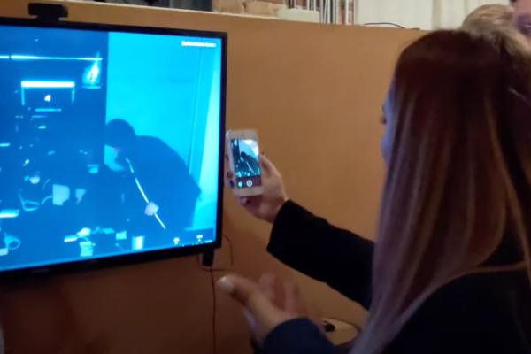 Employees photographing the "break-in"